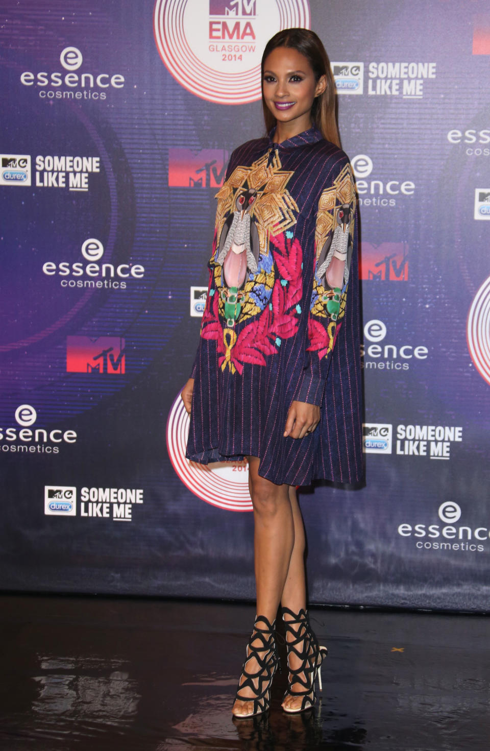 Singer Alesha Dixon poses for photographers upon arrival at the 2014 MTV European Music Awards in Glasgow, Sunday, Nov. 9, 2014. (Photo by Joel Ryan/Invision/AP)