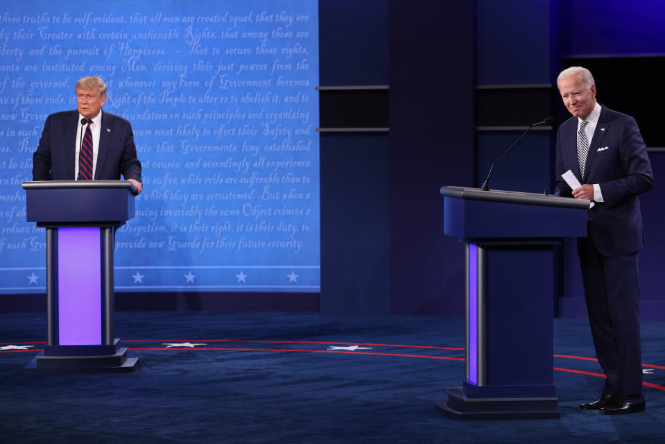 CLEVELAND, OHIO - SEPTEMBER 29:  U.S. President Donald Trump and Democratic presidential nominee Joe Biden look out to the audience at end of the first presidential debate at the Health Education Campus of Case Western Reserve University on September 29, 2020 in Cleveland, Ohio. This is the first of three planned debates between the two candidates in the lead up to the election on November 3. (Photo by Win McNamee/Getty Images)