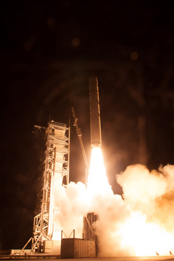 A Minotaur V rocket carrying NASA's Lunar Atmosphere and Dust Environment Explorer (LADEE) lifts off from at NASA's Wallops Flight Facility in Virginia on Friday, Sept. 6, 2013. 