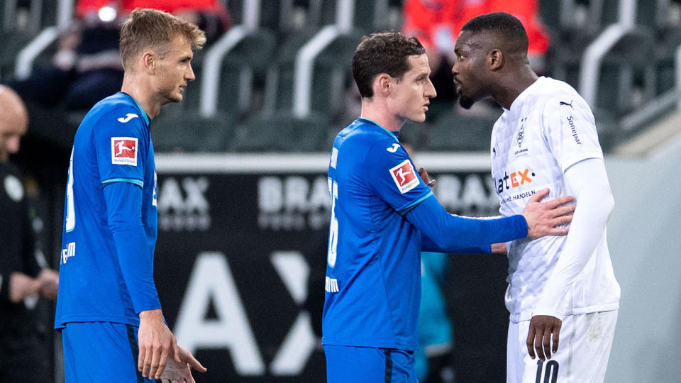 Seen here, Marcus Thuram and Stefan Posch clashing in the Bundesliga.