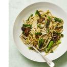 <p>Pasta is a great go-to when you are rushing to get a meal on the table, but that doesn't mean it can't be packed with some protein. Add grilled veggies and scallions to give classic spaghetti more flavor and nutrients. </p><p><em><a href="https://www.womansday.com/food-recipes/a32699458/whole-wheat-spaghetti-with-grilled-asparagus-and-scallions-recipe/" rel="nofollow noopener" target="_blank" data-ylk="slk:Get the Whole-Wheat Spaghetti with Grilled Asparagus and Scallions recipe.;elm:context_link;itc:0;sec:content-canvas" class="link ">Get the Whole-Wheat Spaghetti with Grilled Asparagus and Scallions recipe. </a></em> </p>