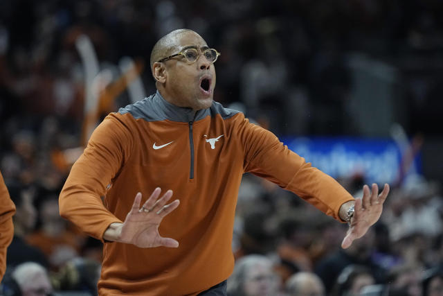 Texas acting head coach Rodney Terry talks to his players during the second half of an NCAA college basketball game against TCU in Austin, Texas, Wednesday, Jan. 11, 2023. (AP Photo/Eric Gay)