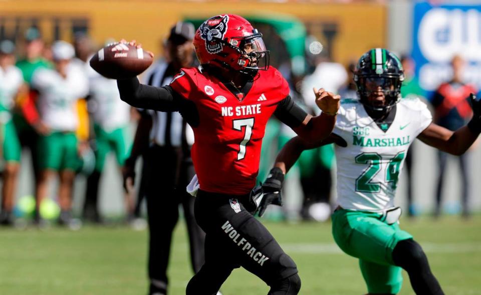 N.C. State quarterback MJ Morris (7) prepares to throw during the first half of N.C. State’s game against Marshall at Carter-Finley Stadium in Raleigh, N.C., Saturday, Oct. 7, 2023.