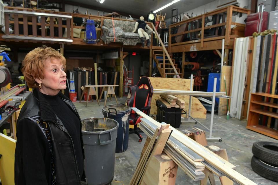 Stage Crafters Community Theatre member and director Nancy Kruzek surveys the work area where stage props and decorations are created for the group's theatrical productions. Stage Crafter's recently received a grant for $100,000 from Impact100 of Northwest Florida to help the theater company purchase the property where its warehouse and rehearsal building stands.