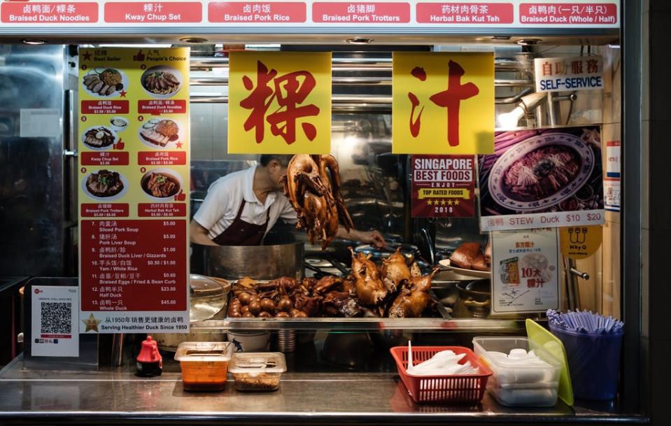 A chicken vendor at Singapore’s Maxwell Food Centre (Getty)