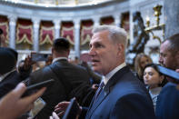 Speaker of the House Kevin McCarthy, R-Calif., stops for reporters' questions about passing a funding bill and avoiding a government shutdown, at the Capitol in Washington, Monday, Sept. 18, 2023. McCarthy is trying to win support from right-wing Republicans by including spending cuts and conservative proposals for border security and immigration. (AP Photo/J. Scott Applewhite)