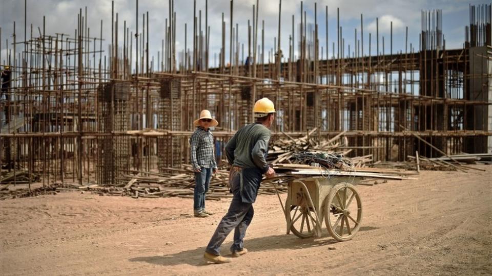 Chinese workers working on railway infrastructure on the new tracks linking Djibouti with Addis Ababa on 5 May, 2015