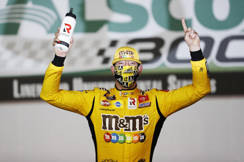 Kyle Busch (54) celebrates after winning the NASCAR Xfinity Series auto race at Charlotte Motor Speedway Monday, May 25, 2020, in Concord, N.C. (AP Photo/Gerry Broome)