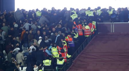 West Ham and Chelsea fans clash after the match. West Ham United v Chelsea - EFL Cup Fourth Round - London Stadium - 26/10/16. Reuters / Eddie Keogh Livepic