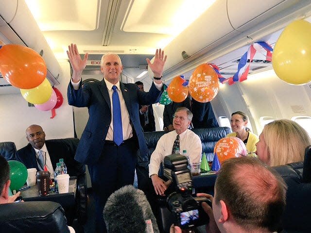 Mike Pence celebrates his birthday on Air Force Two, decorated with balloons and streamers