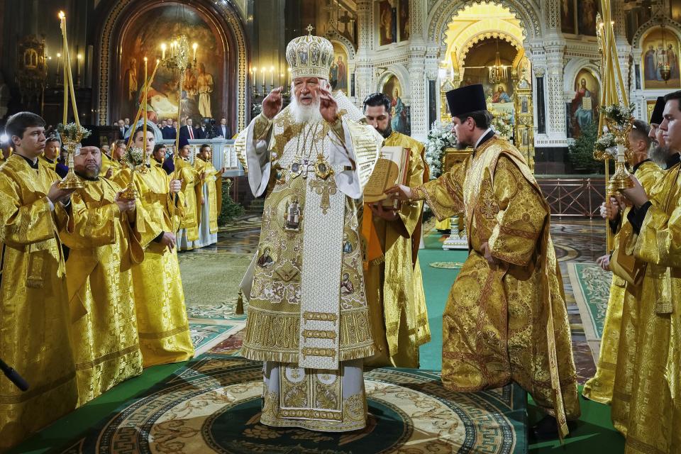 In this photo released by Russian Orthodox Church Press Service, Russian Orthodox Patriarch Kirill, center, delivers the Christmas service in the Christ the Saviour Cathedral in Moscow, Russia, on Saturday, Jan. 6, 2024. While much of the world has Christmas in the rearview mirror by now, people in some Eastern Orthodox traditions celebrate the holy day on Sunday, Jan. 7. (Oleg Varov, Russian Orthodox Church Press Service via AP)