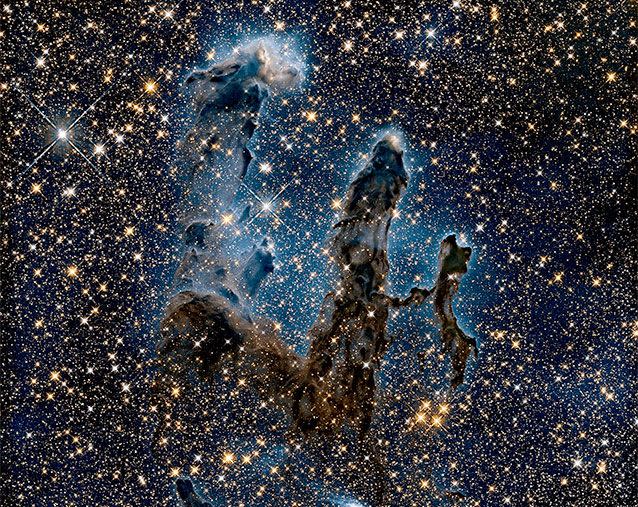 The 'Pillars of Creation' are seen surrounded by myriad stars. Photo: NASA/ESA/Hubble
