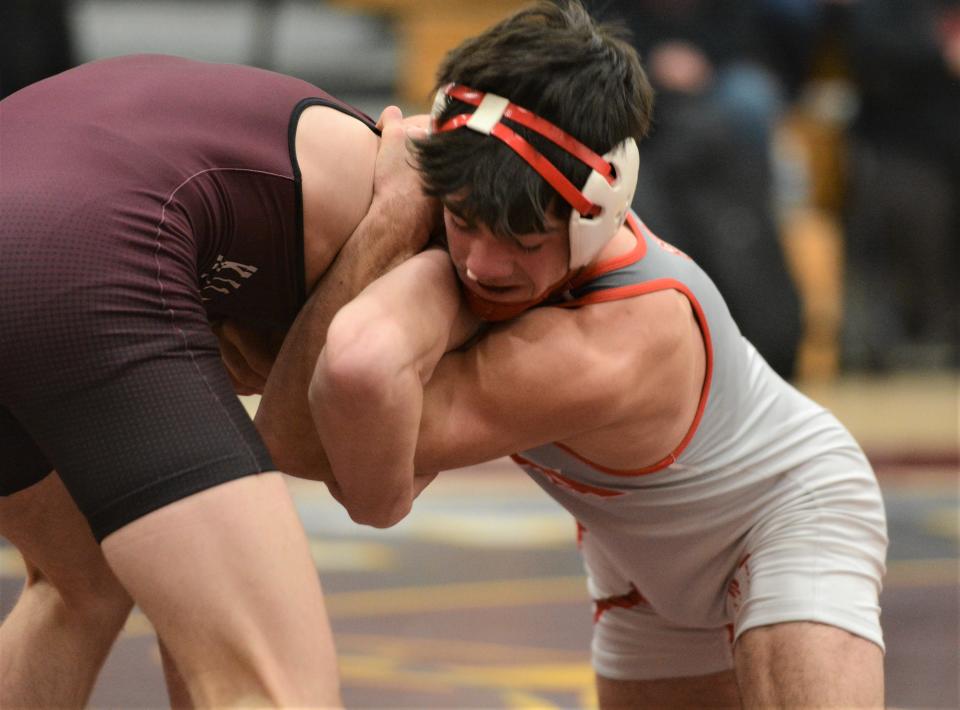 NFA senior Tom Brunell battles against Killingly's Jack Richardson on Feb. 1 at Killingly High School.