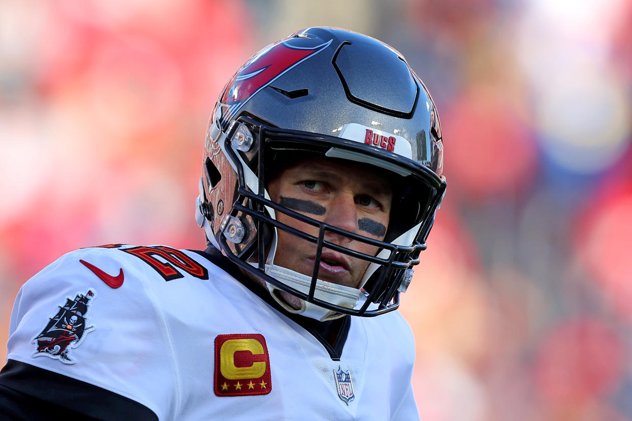 TAMPA, FLORIDA - JANUARY 23: Tom Brady #12 of the Tampa Bay Buccaneers reacts in the second quarter of the game against the Los Angeles Rams in the NFC Divisional Playoff game at Raymond James Stadium on January 23, 2022 in Tampa, Florida. (Photo by Kevin C. Cox/Getty Images)