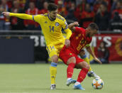 Belgium's Eden Hazard, right, and Kazakhstan's Yuri Pertsukh challenge for the ball during the Euro 2020 group I qualifying soccer match between Kazakhstan and Belgium at the Astana Arena stadium in Nur-Sultan, Kazakhstan, Sunday, Oct. 13, 2019. (AP Photo)