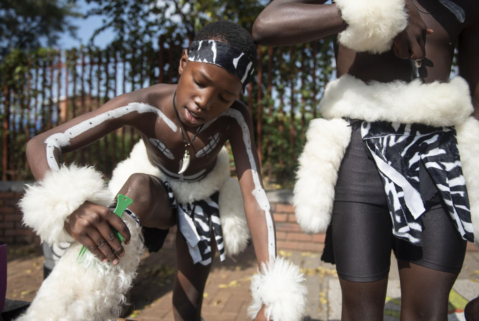 Zulu dancers prepare to perform on Soweto's Vilakazi Street in Soweto, Johannesburg, South Africa, Saturday, April 27, 2024 as the country celebrates Freedom Day. The day marks April 27 when the country held pivotal first democratic election in 1994 that announced the official end of the racial segregation and oppression of apartheid. (AP Photo)