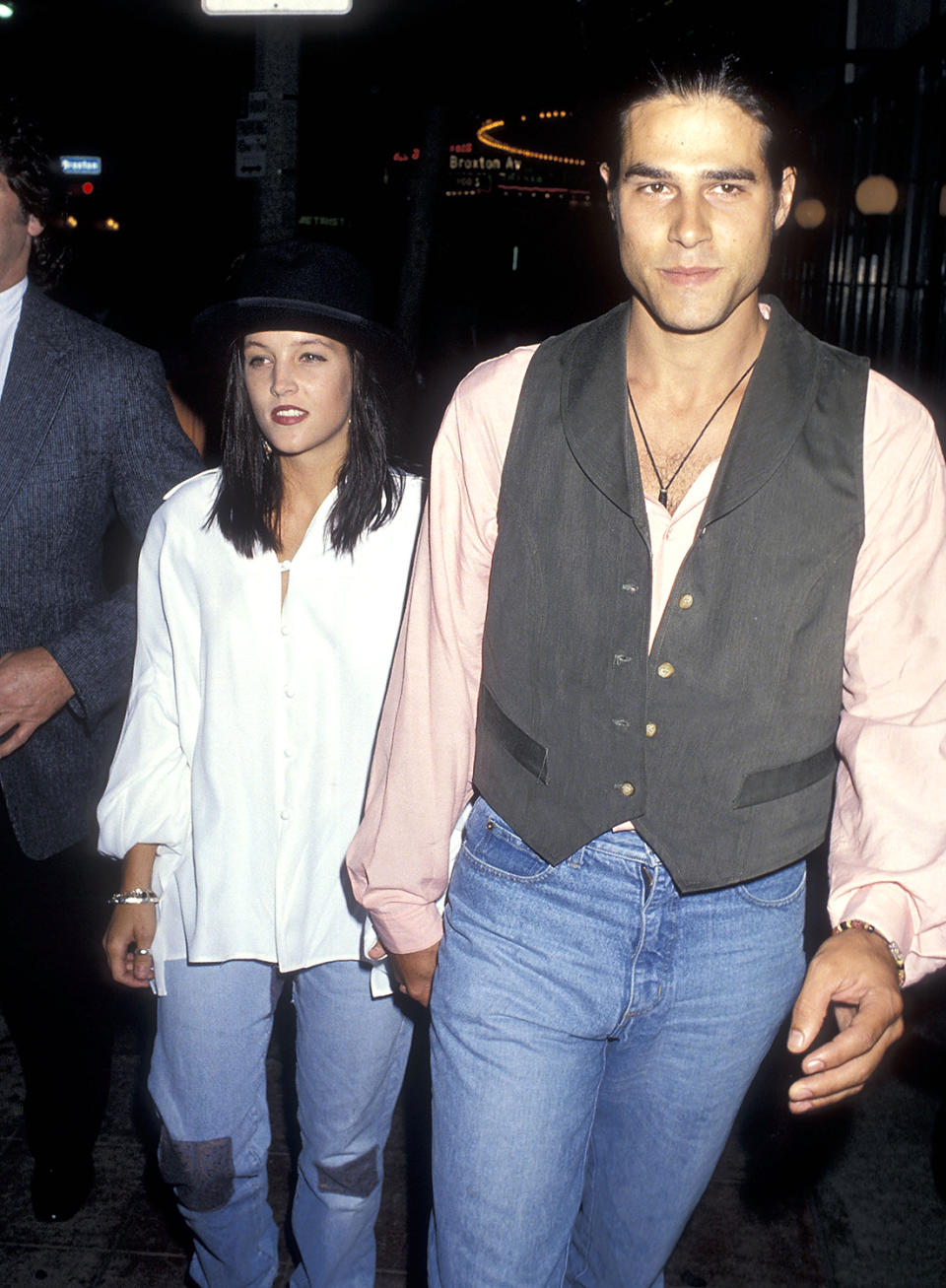 <p>Lisa Marie, who inherited her father’s estate, didn’t follow in his footsteps to a music career until the aughts. Prior to that, her romances made the biggest headlines. In 1988, 20-year-old Lisa Marie married musician Danny Keough. They had two children together — actress Riley Keough, now 28, and Benjamin, 25. The couple, pictured here in 1991, was divorced by 1994 but remained close. For a period, Keough, also a Scientologist, lived in Lisa Marie’s guesthouse. “We keep that unit very in order, no matter how crazy we are,” she told ABC News. (Photo: Ron Galella, Ltd./WireImage) </p>