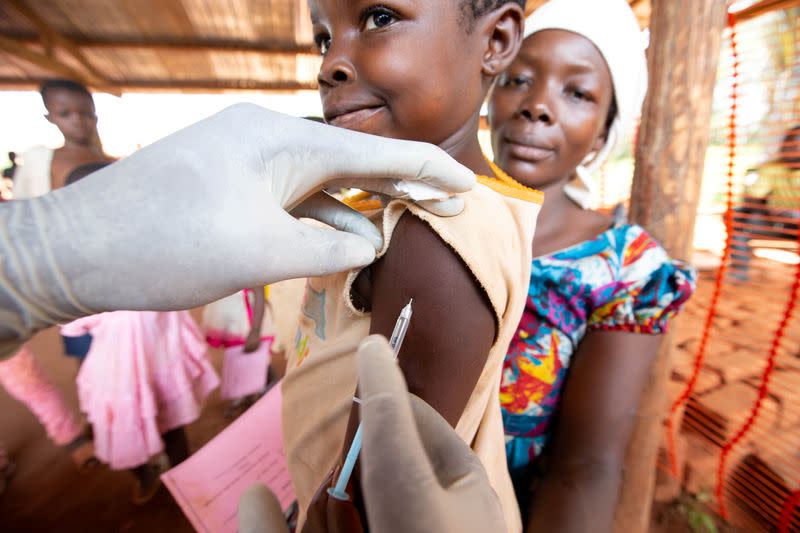 FILE PHOTO: A child is given a measles vaccination during an emergency campaign run by Doctors Without Borders in Likasa, Mongala province