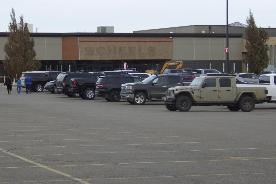 The Scheels sporting goods store is seen Monday, Nov. 13, 2023, in Bismarck, N.D. Bismarck police fatally shot 17-year-old Nicholas Bruington during a traffic stop in the parking lot near the store, early Sunday, Nov. 12. Bruington was the lead suspect in a police investigation into a reported shooting nearby. (AP Photo/Jack Dura)