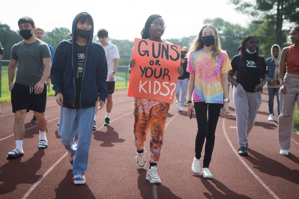 Brandywine High School students walk around the track during a walkout in protest of gun violence Thursday, June 2, 2022. 