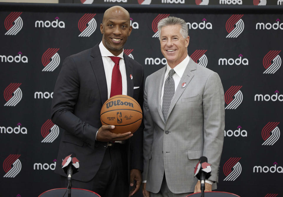 Neil Olshey, right, and Chauncey Billups pose after Billups was announced as the head coach of the Portland Trail Blazers at the team's practice facility in Tualatin, Ore., Tuesday, June 29, 2021. (AP Photo/Craig Mitchelldyer)
