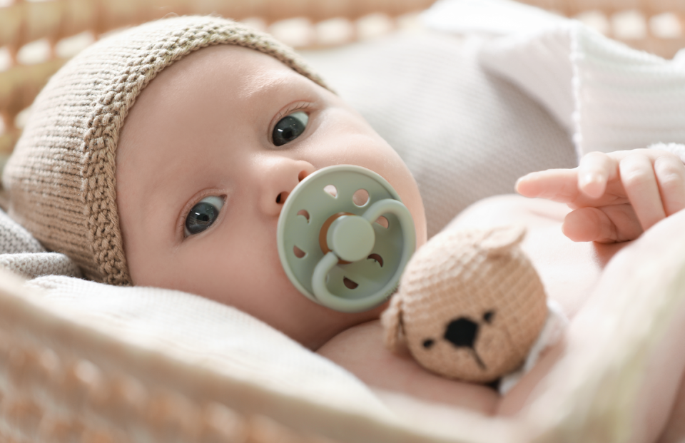 a baby with a stuffed animal