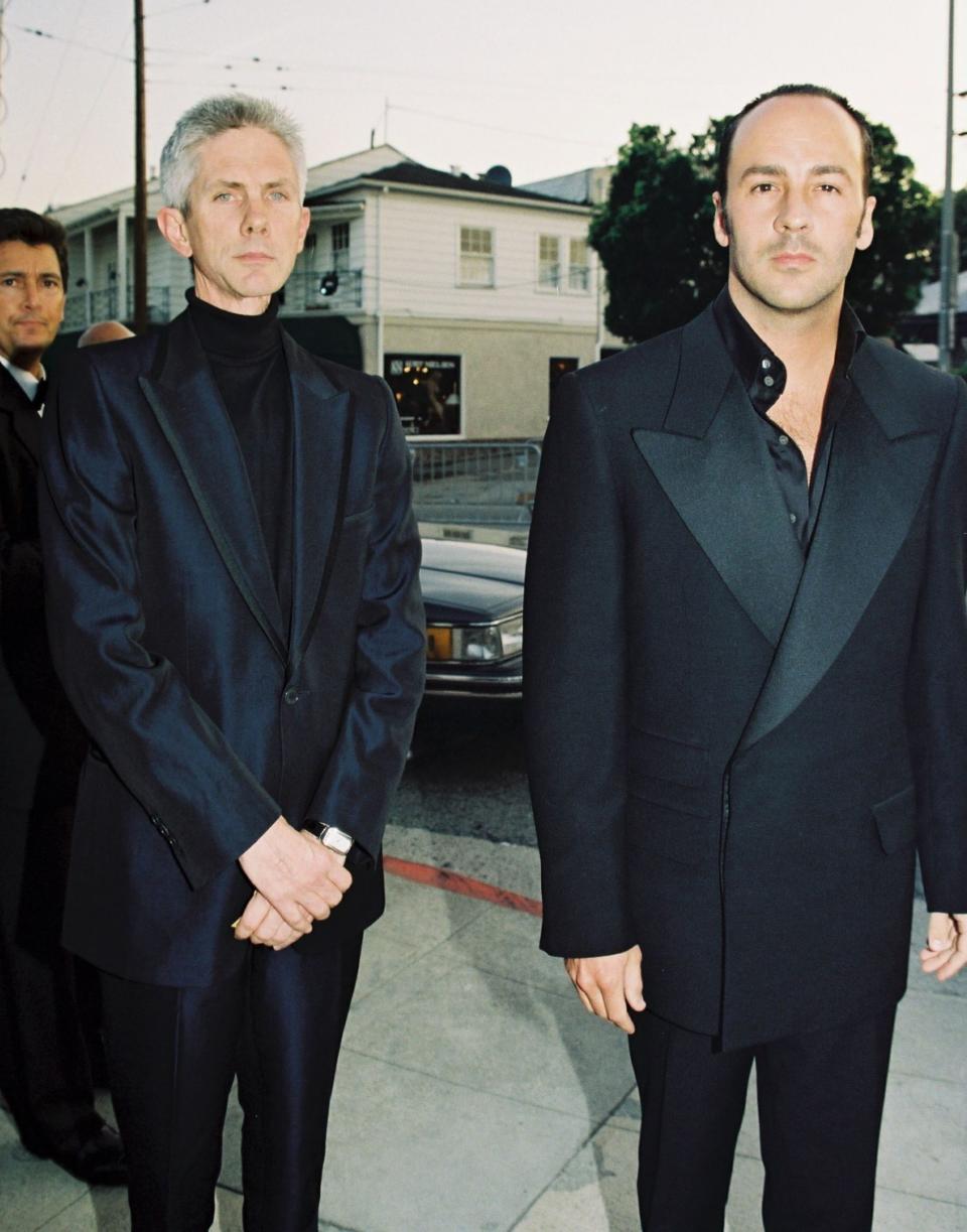 Slim and with piercing blue eyes, Buckley could appear an enigmatic figure beside the superstar designer Tom Ford (here, in 1997 at the Vanity Fair Oscar Party, Hollywood - Eric Charbonneau/BEImages/Shutterstock