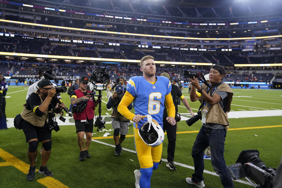 Los Angeles Chargers place kicker Dustin Hopkins (6) leaves the field after an NFL football game, Monday, Oct. 17, 2022, in Inglewood, Calif. The Chargers defeated the Broncos 19-16 in overtime. (AP Photo/Marcio Jose Sanchez)