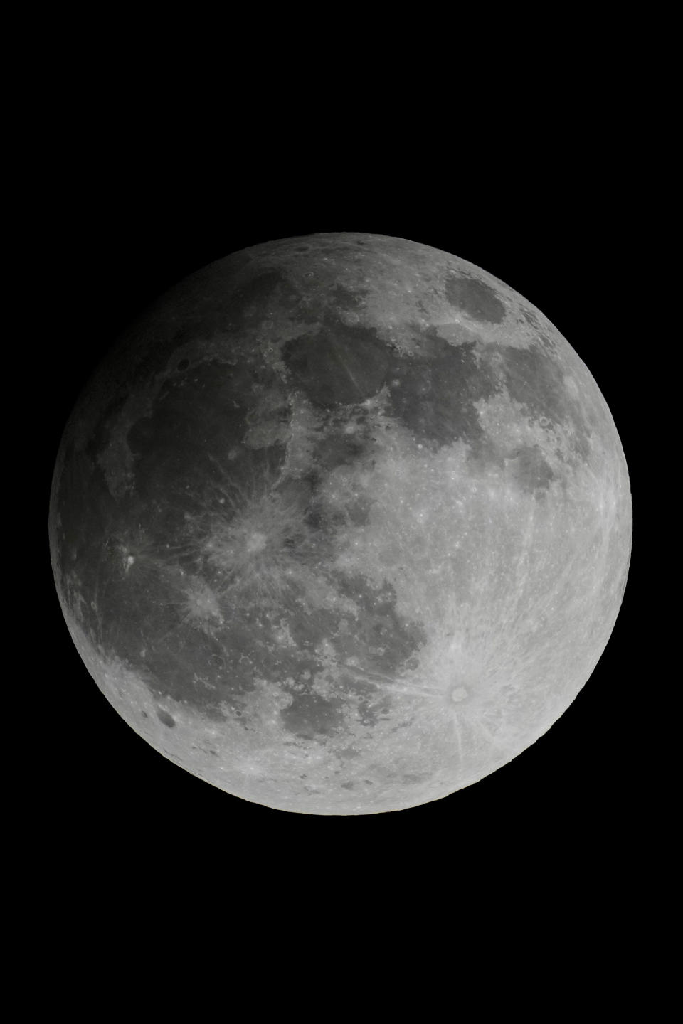 A penumbral lunar eclipse is recorded at IST 22.56 in Kolkata, India, Friday, May 5, 2023. (AP Photo/Bikas Das)