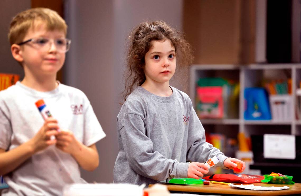 Amelia Copersito works in her first grade class at St. Mary Magdalene Catholic School in Apex on Jan. 24.