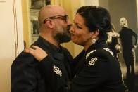 Russian soprano Anna Netrebko, kisses with director Davide Livermore prior to the start of a news conference to present Giuseppe Verdi's 'Macbeth', directed by Italian conductor Riccardo Chailly, who will open the opera season at the La Scala opera house next, Dec.7, in Milan, Italy, Monday, Nov. 29, 2021. (AP Photo/Luca Bruno)