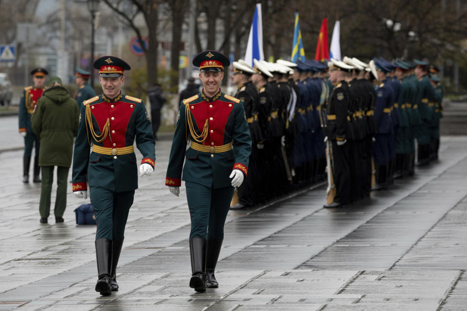 CORRECTS TO DELAYED INSTEAD OF CANCELLED - Honor guards prepare for a wreath laying ceremony with participation of North Korean leader Kim Jong Un, that was delayed in Vladivostok, Russia, Friday, April 26, 2019. Russian President Vladimir Putin says he's willing to share details with the United States about his summit on Thursday with Kim Jong Un, potentially raising Russia's influence in the stalemated issue of North Korean denuclearization. (AP Photo/Alexander Khitrov)