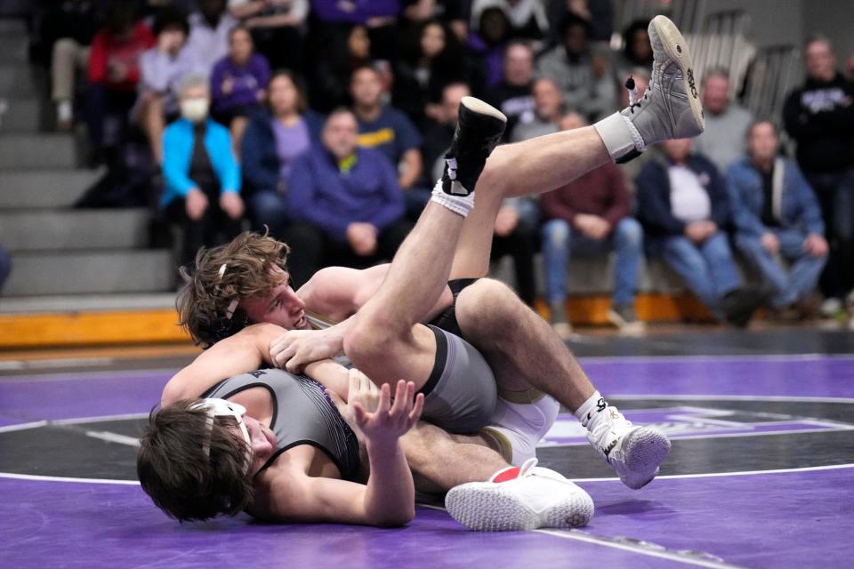 Watterson’s Mitchell Younger, back, competes against DeSales’ Aiden Rush during the CCL duals Wednesday night at DeSales. Younger, who won last year's Division II state title at 144 pounds, went 4-0 in the event.