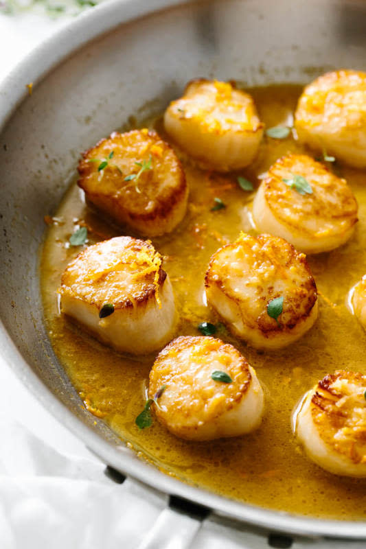 <p>Downshiftology</p><p>Scallops are healthy, super easy and delicious to make at home. These restaurant-worthy scallops are pan-seared and topped with a delicious citrus ginger sauce. They’re so tender and smooth that they’ll melt in your mouth!</p><p><strong>Get the recipe: <a href="https://downshiftology.com/recipes/pan-seared-scallops-citrus-ginger-sauce/" rel="nofollow noopener" target="_blank" data-ylk="slk:Pan-Seared Scallops with Citrus Ginger Sauce;elm:context_link;itc:0;sec:content-canvas" class="link ">Pan-Seared Scallops with Citrus Ginger Sauce</a></strong></p>