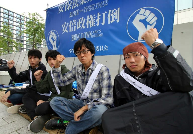 University students stage a hunger strike in front of the National Diet building in Tokyo, on August 28, 2015, to protest against Japanese Prime Minister Shinzo Abe's controversial security bills