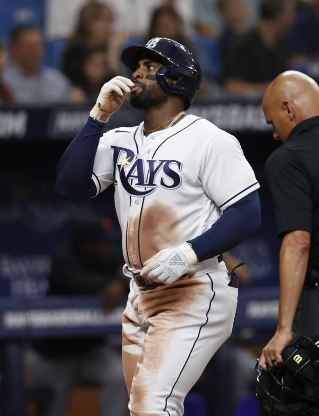 Tampa Bay Rays' Yandy Diaz reacts after hitting a two-run home run against the Detroit Tigers during the fourth inning of a baseball game Saturday, April 1, 2023, in St. Petersburg, Fla. (AP Photo/Scott Audette)