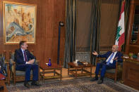Britain's Foreign Secretary David Cameron, left, meets with Lebanese Parliament Speaker Nabih Berri in Beirut, Lebanon, Thursday, Feb. 1, 2024. Cameron discussed with Lebanese officials the volatile situation in the Middle East during a stop in Beirut, part of a regional tour. (AP Photo/Bilal Hussein)