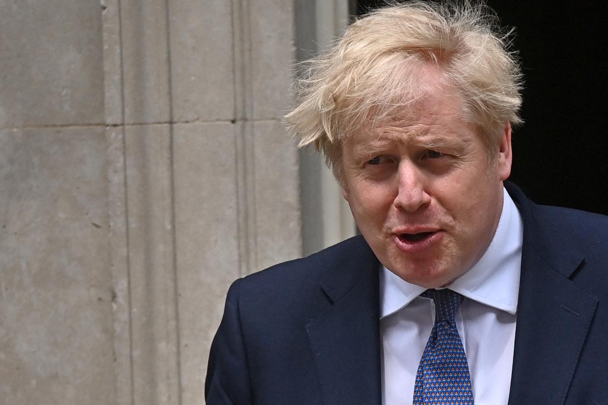 Britain's Prime Minister Boris Johnson reacts as he exits 10 Downing Street in central London on May 28, 2021, to greet Hungary's Prime Minister Viktor Orban ahead of their meeting. (Photo by Ben STANSALL / AFP) (Photo by BEN STANSALL/AFP via Getty Images)