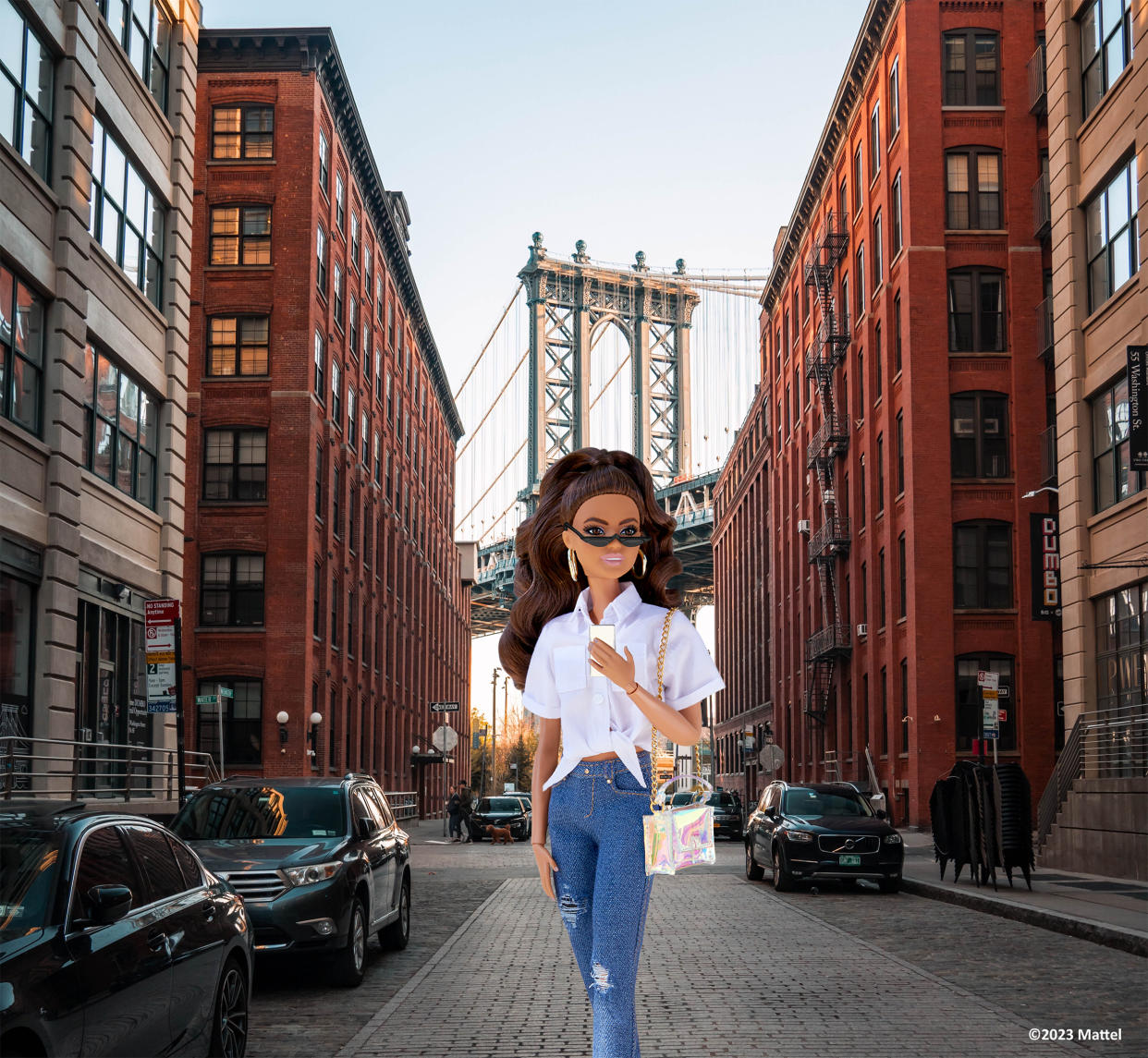 Barbie enjoying a New York photo op. (@barbiecafeofficial via Instagram)