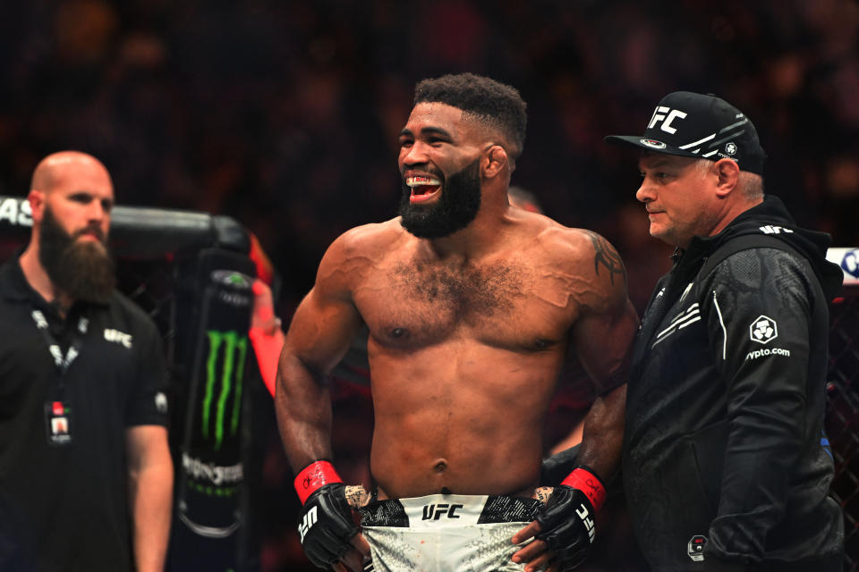 Jan 20, 2024; Toronto, Canada, USA; Chris Curtis (red glove) celebrates defeating Marc-Andre Barriault (blue gloves) during UFC 297 at ScotiaBank Arena. Mandatory Credit: Dan Hamilton-USA TODAY Sports