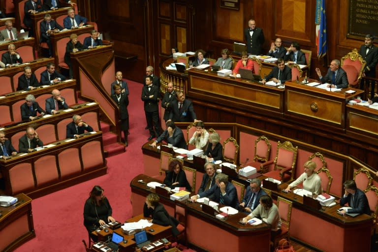 Senate President Pietro Grasso (right) speaks during a budgetary debate in Rome, on December 7, 2016