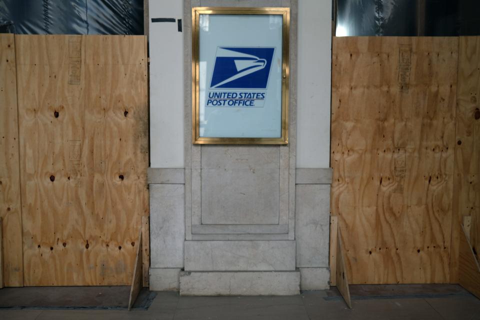 NEW YORK, NEW YORK - AUGUST 05: A United States Postal Service (USPS) sign is displayed at a post office location on August 05, 2020 in New York City. The USPS, the nations national mail carrier service, is under increased scrutiny from politicians who are warning that the agency is not prepared to handle the tens of millions of mail-in ballots which are expected to be sent for the November election. President Trump in recent weeks has called the Postal Service a joke as the agency is experiences delays in mail delivery due to the coronavirus pandemic and financial pressures. (Photo by Spencer Platt/Getty Images) ORG XMIT: 775543359 ORIG FILE ID: 1264141132