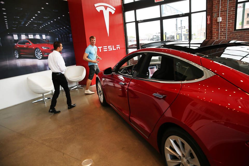 NEW YORK, NY - JULY 05:  A Tesla model S sits parked in a new Tesla showroom and service center in Red Hook, Brooklyn on July 5, 2016 in New York City. The electric car company and its CEO and founder Elon Musk have come under increasing scrutiny following a crash of one of its electric cars while using the controversial autopilot service. Joshua Brown crashed and died in Florida on May 7 in a Tesla car that was operating on autopilot, which means that Brown's hands were not on the steering wheel.  (Photo by Spencer Platt/Getty Images)