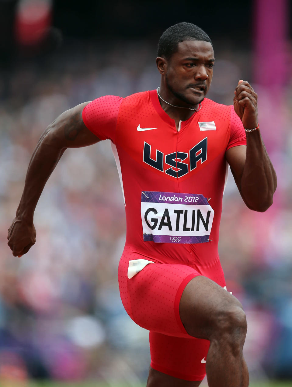 LONDON, ENGLAND - AUGUST 04: Justin Gatlin of the United States competes in the Men's 100m Round 1 Heats on Day 8 of the London 2012 Olympic Games at Olympic Stadium on August 4, 2012 in London, England. (Photo by Streeter Lecka/Getty Images)