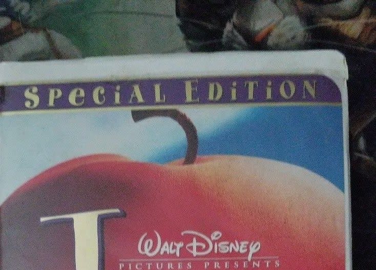 A Disney VHS tape with the corner chewed on