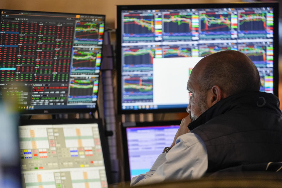 A trader works on the floor of the New York Stock Exchange shortly after the opening bell, Wednesday, April 24, 2024, in New York. (AP Photo/Mary Altaffer)