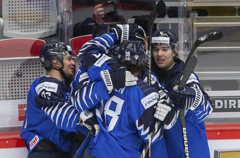Finland players celebrate a goal during the World Junior Ice Hockey Championships Group A match between Sweden and Finland in Trinec, Czech Republic, Thursday Dec. 26, 2019. (Vladimir Prycek/CTK via AP)