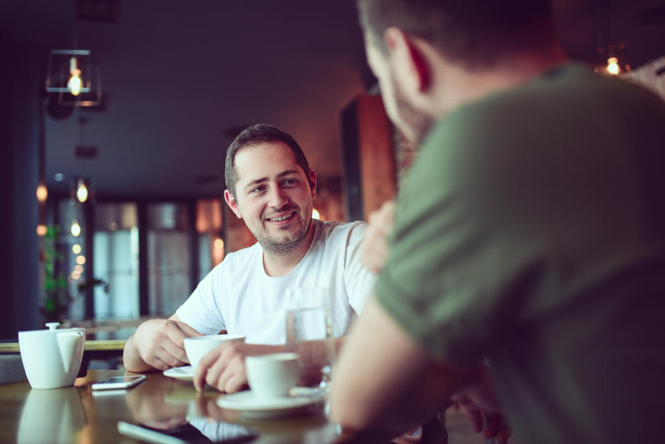 Two man talking in the pub about how they feel. (Getty Images)