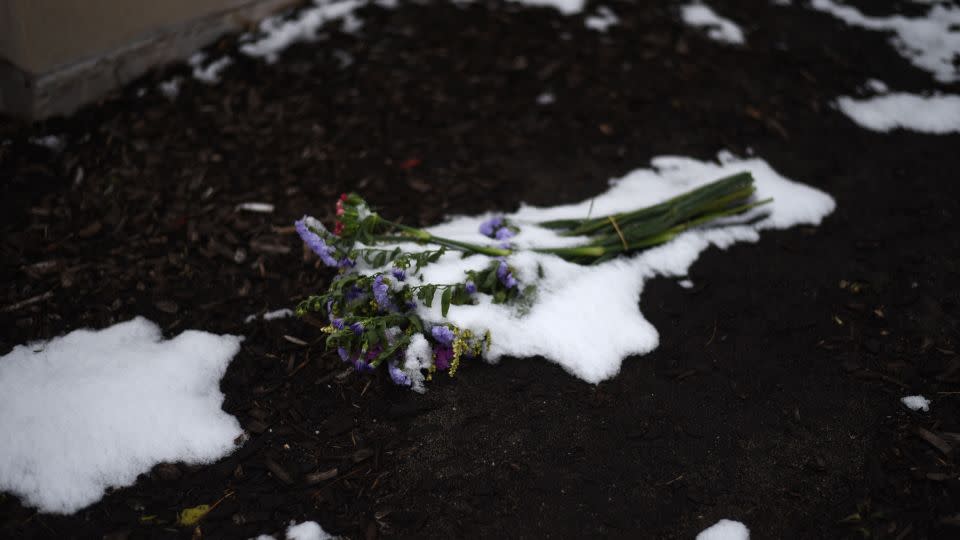 Flowers are left at Union Station in Kansas City, Missouri, on February 16, 2024. - Emmalee Reed/CNN