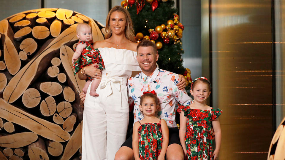 Candice Warner is pictured here posing for a Christmas photo with her family.